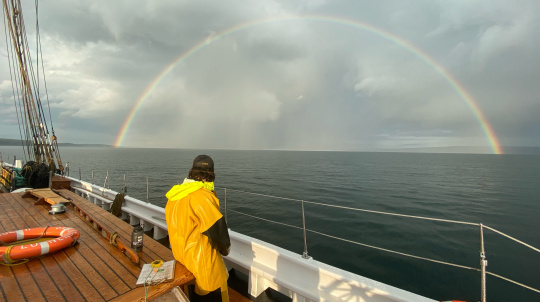 A double rainbow crowning the ship